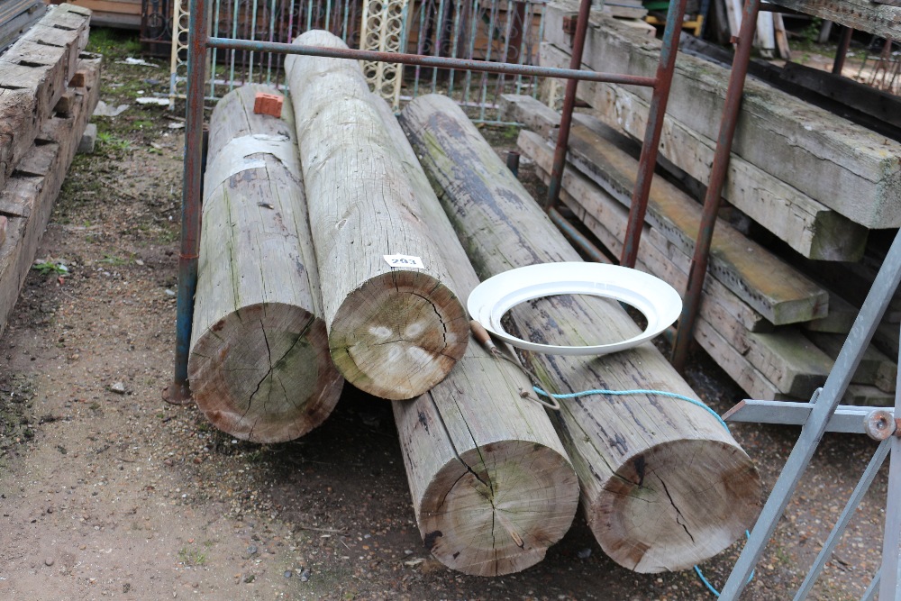 A quantity of four part telegraph poles