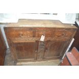 A 1930's oak sideboard