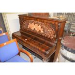 A late Victorian rosewood piano