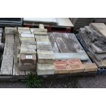 Three pallets of bricks, slabs etc.