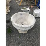 A large pre-cast planter, standing 56cm high and w