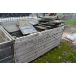 A quantity of flat concrete tiles