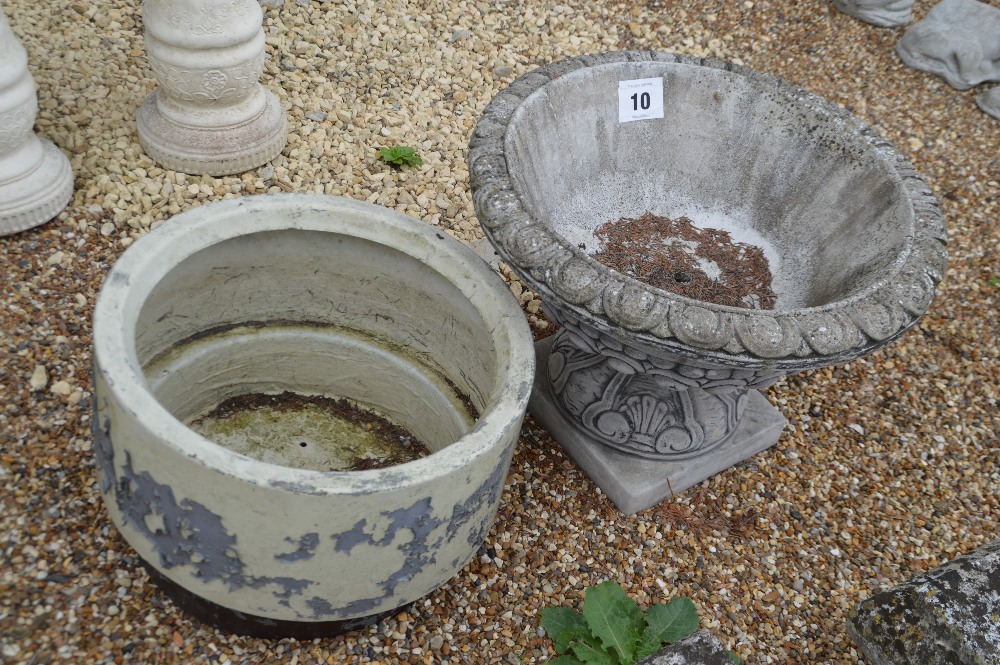 A large pre-cast planter, approx. 50cm and an anothe