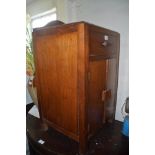 A mahogany bedside cabinet