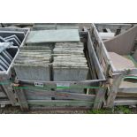 A crate of green stone slabs