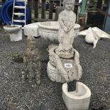 A pre-cast garden water feature, comprising cherub