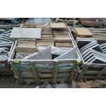 A crate of sandstone and slate slabs