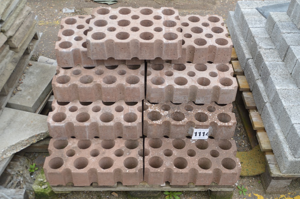 A pallet of perforated path blocks