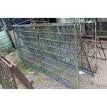 A large pair of metal gates, approx. 254cm tall x