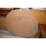 Two circular table tops