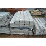 A large quantity of concrete wall cappings