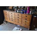 A vintage 16 drawer haberdashery cabinet