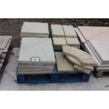 A pallet of concrete garden slabs, smaller example