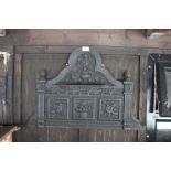 A cast iron over mantel