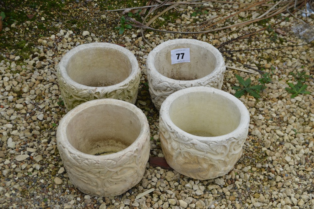 4x similar pre-cast garden planters, approx. 23cm