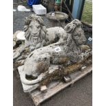 A pair of lion garden ornaments, (pre-cast),