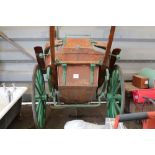 A Governor's cart with small plaque "Awarded Gold