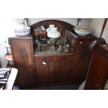 An Antique oak and marble top side cabinet