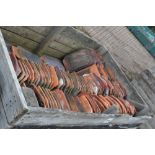 A crate of terracotta pantiles