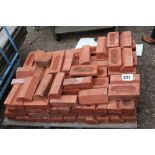 A pallet of edging bricks