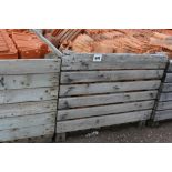 A large crate of roofing tiles