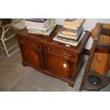 A mahogany low cupboard