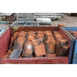 A metal bin and contents comprising of pantiles