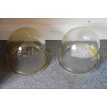 A pair of glass dome lampshades