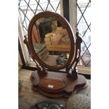 A Victorian mahogany swing toilet mirror