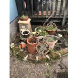 Various garden planters and a chimney