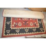 A red and blue patterned rug