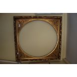 A gilt picture frame