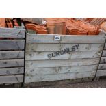 A large crate of roofing tiles