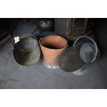 Two copper coal helmets and a copper log bucket