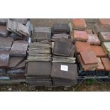 A quantity of concrete peg tiles