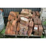 A pallet of shaped bricks