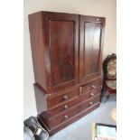 A Victorian mahogany linen press, (cornice missing