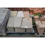 A pallet of stoneware paving slab segments