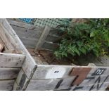 A crate of terracotta peg tiles