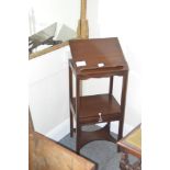 An Antique mahogany washstand with adjustable top