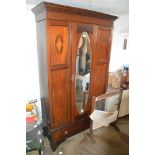 An Edwardian inlaid mahogany wardrobe