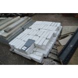 A pallet of breeze block bricks