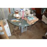 A glass and metal circular kitchen table and a two