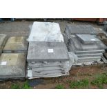 A quantity of large concrete copping stones