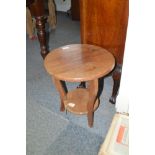 A walnut two tier occasional table