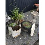A mixed lot to include table ends, planter, wall p