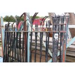 A large pair of wrought iron gates, approx. 220cm