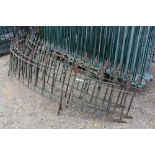 A decorative wrought iron semi circle balcony railing approx.