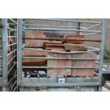 Two steel crates containing terracotta panets, var