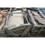 A crate of sandstone segment slabs